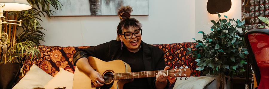 Girl playing guitar